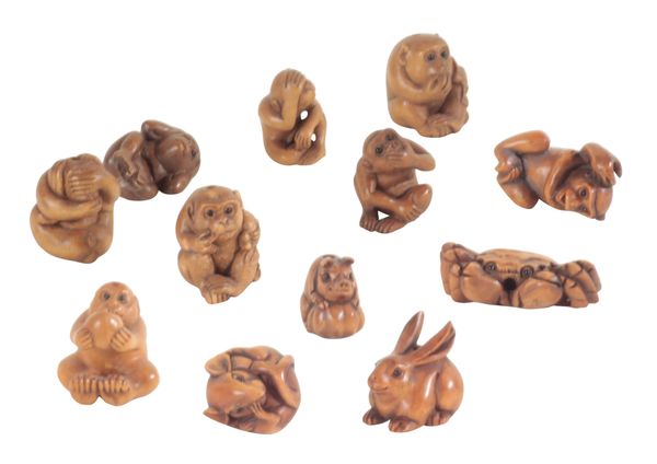 A COLLECTION OF TWELVE JAPANESE NETSUKE AND OJIME