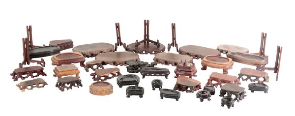 A COLLECTION OF CHINESE WOODEN STANDS