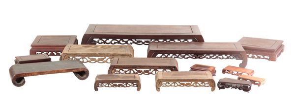A GROUP OF FIFTEEN CHINESE WOODEN STANDS