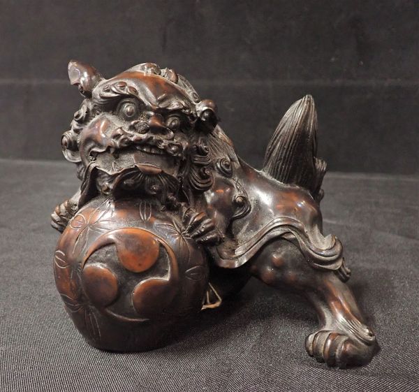 A DOG OF FO FIGURE, WITH PATINATED SURFACE