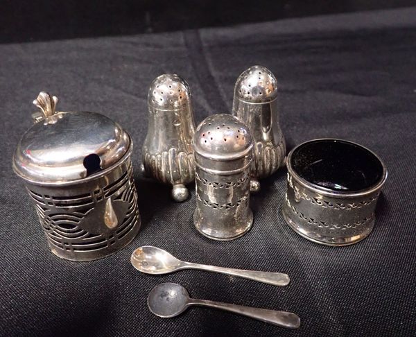 A PAIR OF SILVER GADROONED PEPPER POTS