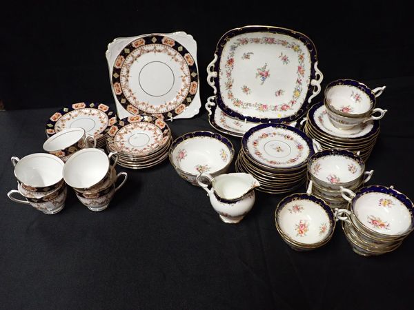 A COALPORT TEA SERVICE FOR TWELVE, WITH FLORAL DECORATION