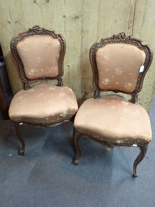 A PAIR OF LOUIS XV STYLE  CARVED WALNUT SALON CHAIRS