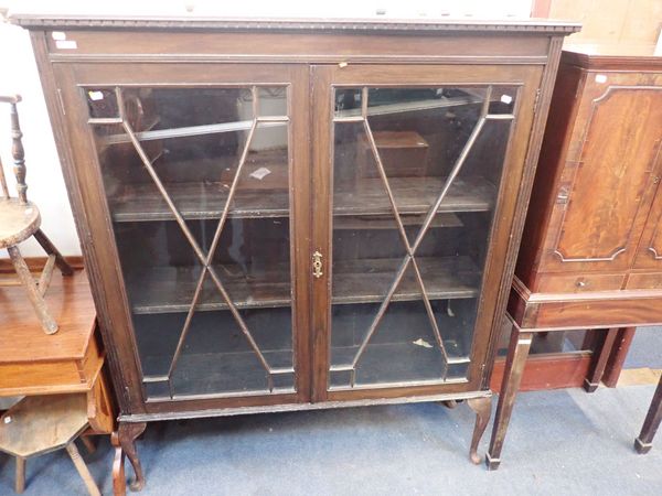 A 1920S GLAZED BOOKCASE