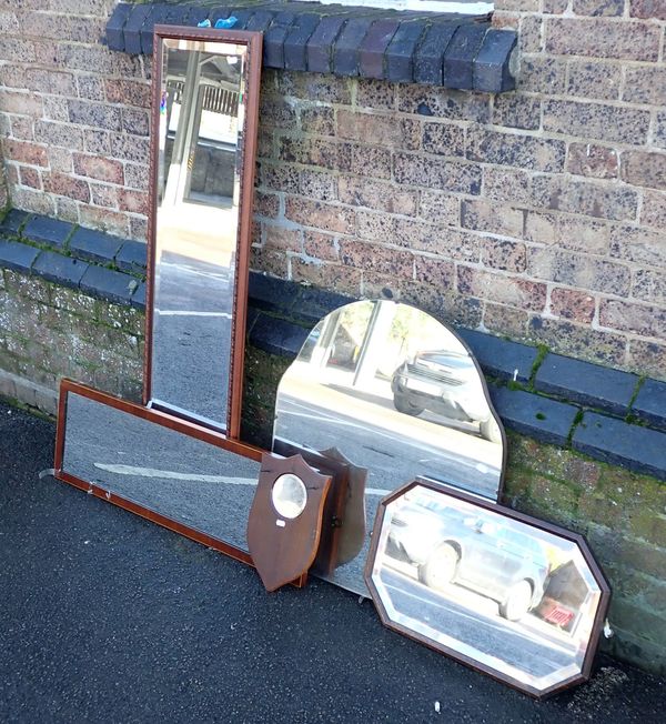 AN EDWARDIAN BEECHWOOD SHIELD SHAPED HALL MIRROR