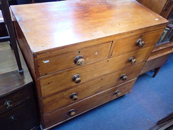 A 19TH CENTURY STRIPPED PINE CHEST OF DRAWERS