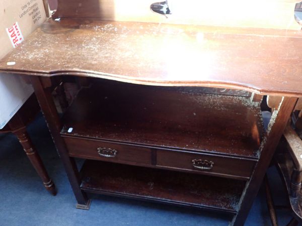 AN EDWARDIAN MAHOGANY THREE-TIER BUFFET