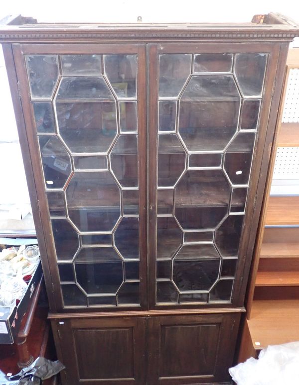 A GEORGE III STYLE MAHOGANY LIBRARY BOOKCASE