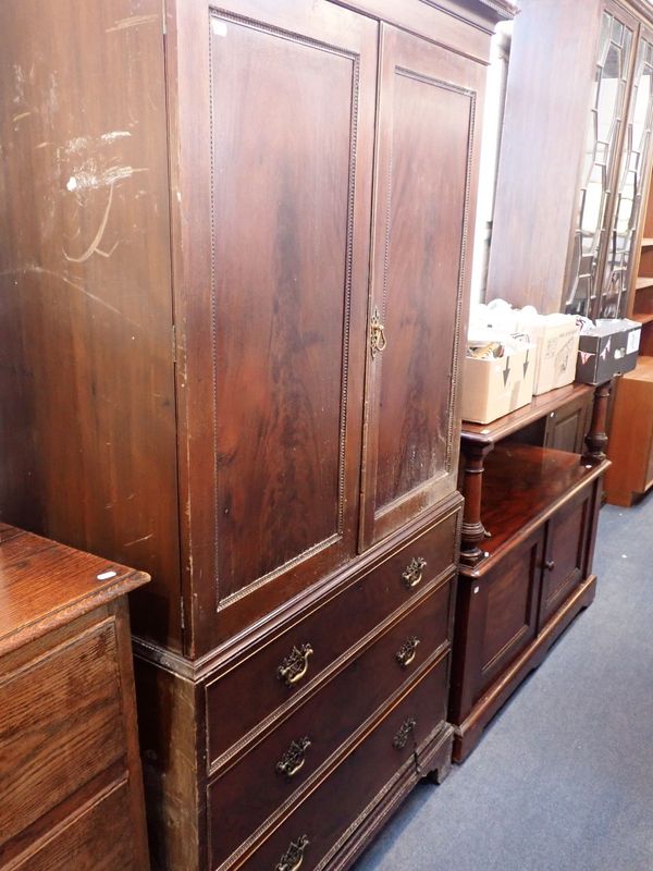 A CHIPPENDALE REVIVAL MAHOGANY LINEN PRESS