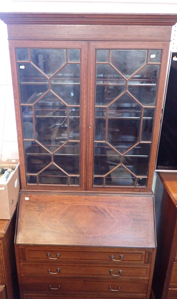 AN EDWARDIAN MAHOGANY BUREAU BOOKCASE