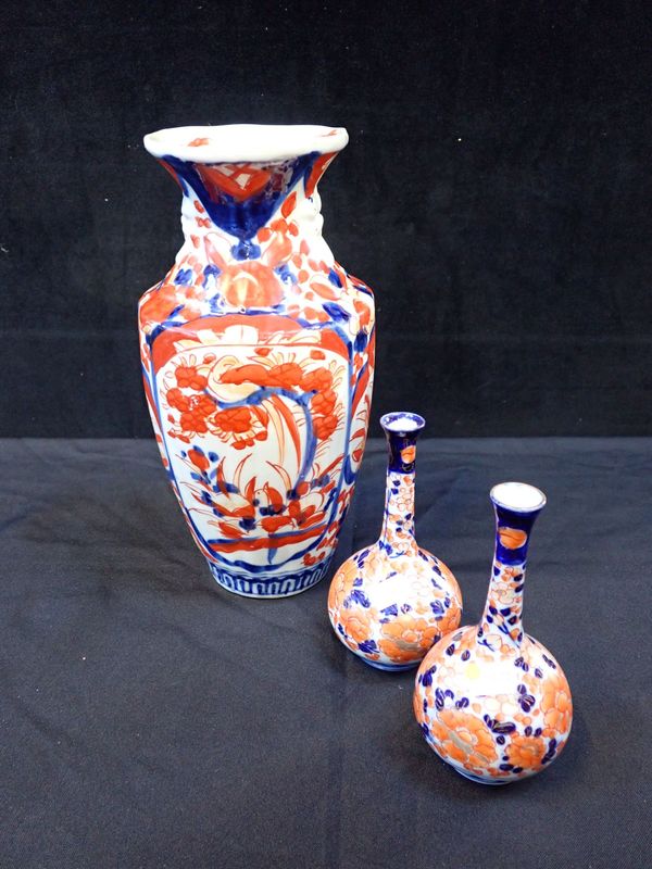 A PAIR OF SMALL IMARI BOTTLE VASES