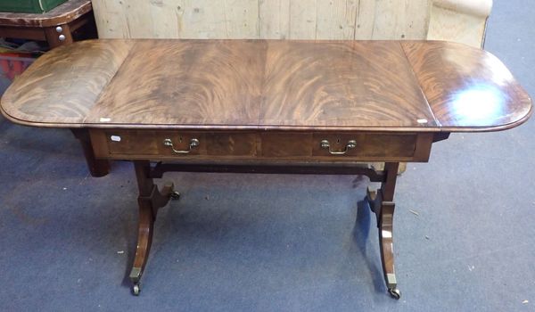 A 19TH CENTURY FIGURED MAHOGANY SOFA TABLE