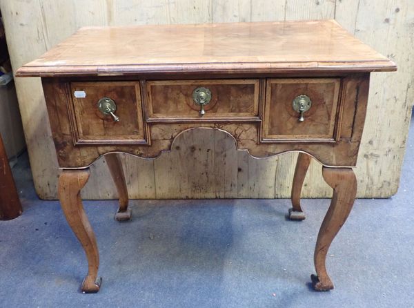 A GEORGE I STYLE WALNUT LOWBOY