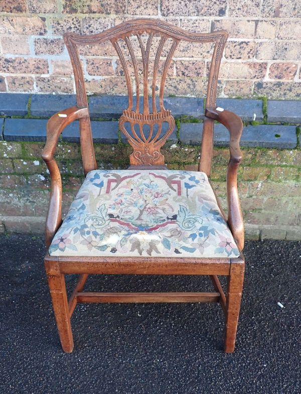 A GEORGE III MAHOGANY ARMCHAIR