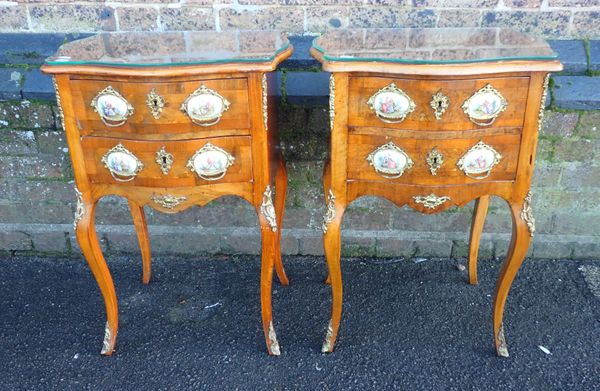 A PAIR OF FRENCH WALNUT , ORMOLU AND PORCELAIN MOUNTED BEDSIDE TABLES