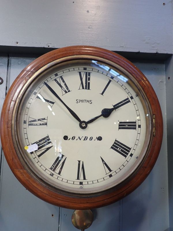 A SMITHS MAHOGANY CASED DIAL CLOCK