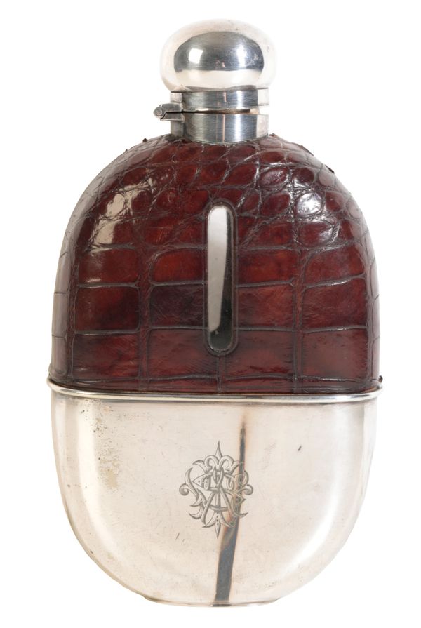 AN EDWARDIAN SILVER-PLATED AND CROCODILE HIP FLASK