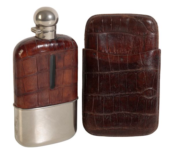 AN EDWARDIAN SILVER-PLATED AND CROCODILE HIP FLASK