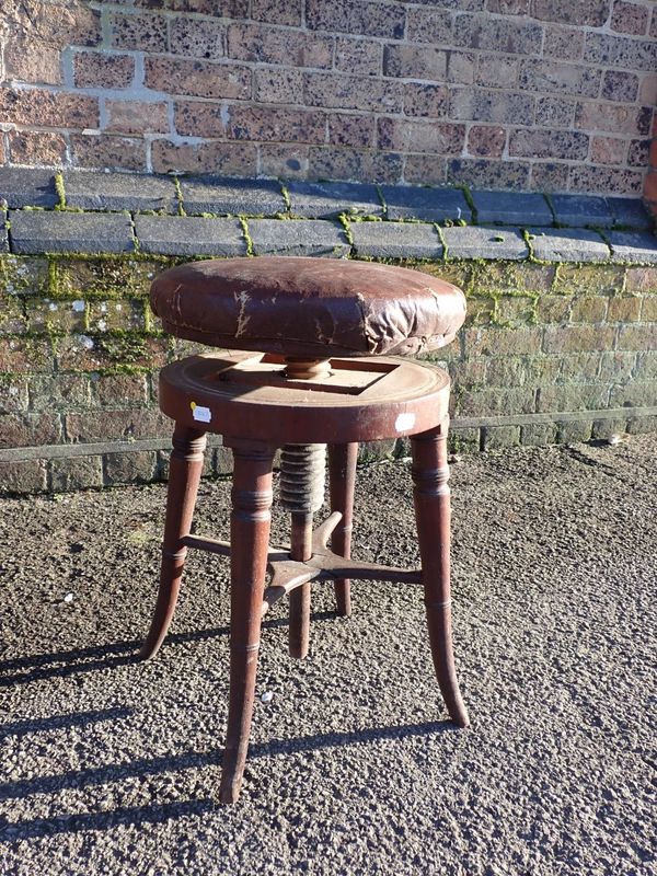 A REGENCY MAHOGANY PIANO STOOL