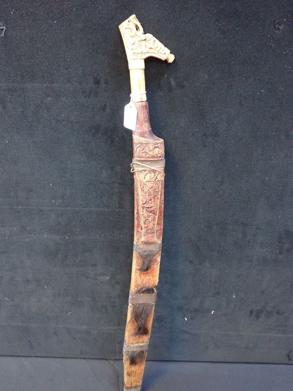 CARVED BONE MANDUL BOVINO HEAD HUNTING SWORD