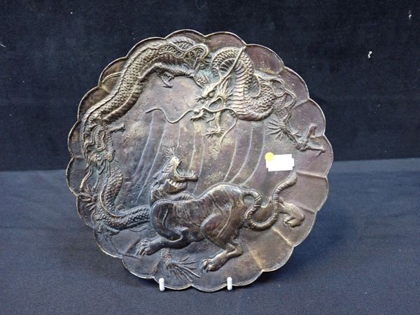 A CHINESE CAST BRASS PLATE OF LOBED FORM