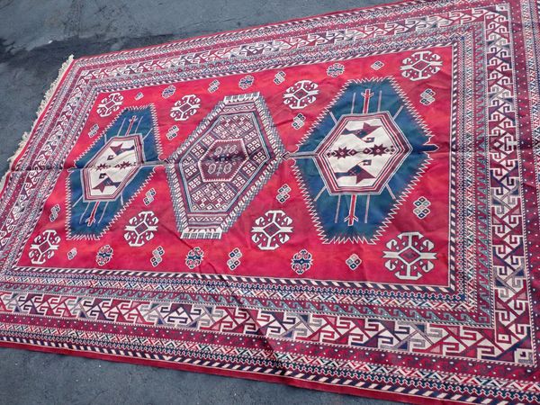 A BELGIAN RED GROUND 'CHIRAZ' RUG