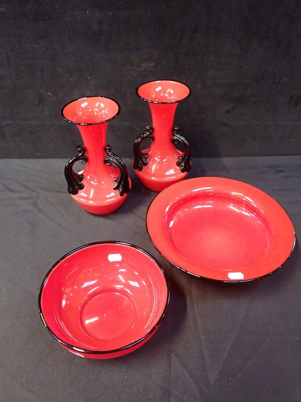 A PAIR OF RED AND BLACK ART GLASS VASES