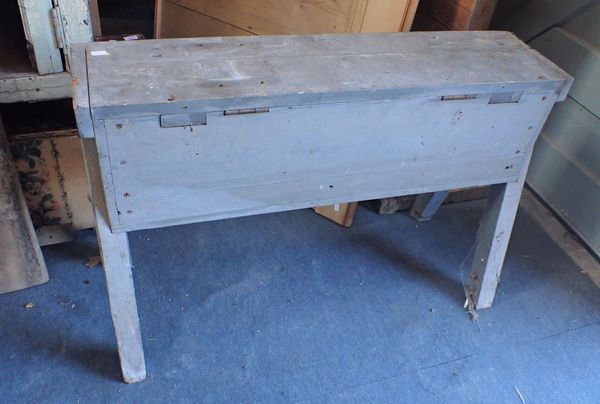 AN OLD CARPENTER'S SAW HORSE, WITH HINGED TOP