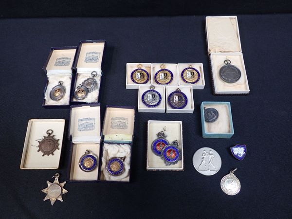 A COLLECTION OF SPORTING WINNER MEDALS