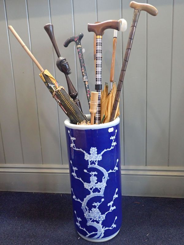 A CHINESE PRUNUS CYLINDER STICK STAND
