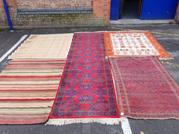 A NORTH-WEST PERSIAN RUG, WOVEN IN BLUE