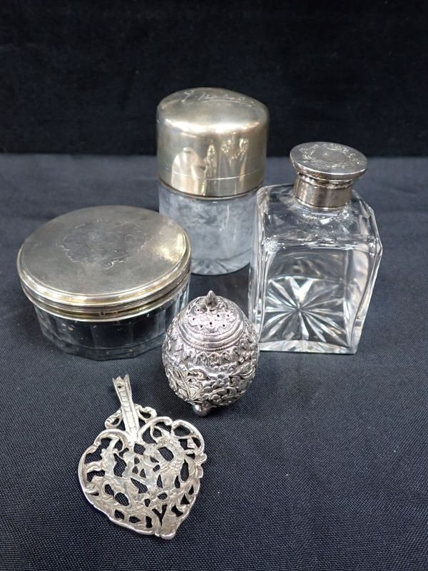 THREE SILVER-TOPPED JARS, AN INDIAN WHITE METAL PEPPERETTE