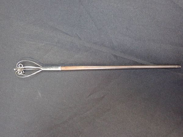 A19TH CENTURY UNMARKED WHITE METAL WHISK