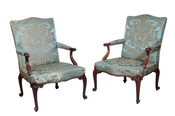 A PAIR OF GEORGE III MAHOGANY GAINSBOROUGH ARMCHAIRS
