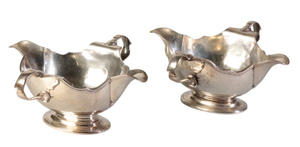 A PAIR OF GEORGE II SILVER TWIN-HANDLED SAUCEBOATS