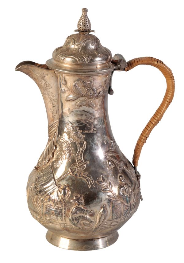 A GEORGE III SILVER HOT WATER JUG