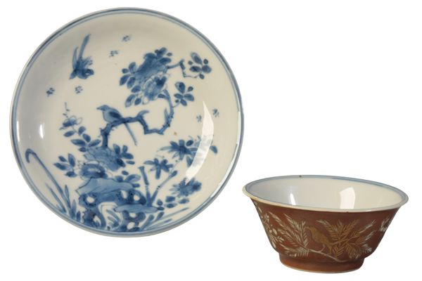 A CHINESE TEA BOWL AND SAUCER