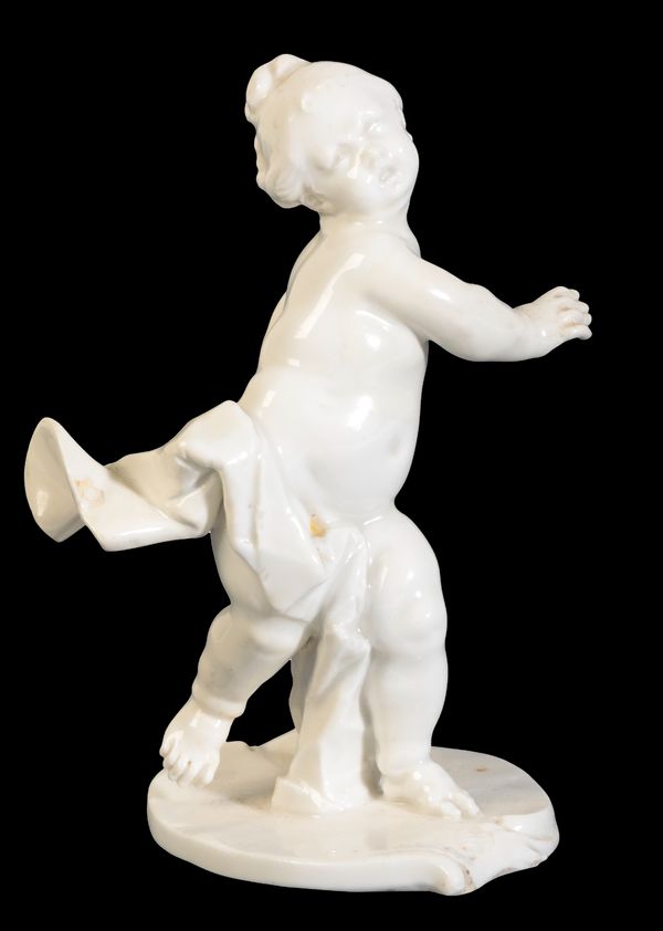 A NYMPHENBURG WHITE FIGURE OF A PUTTO (FLORA)