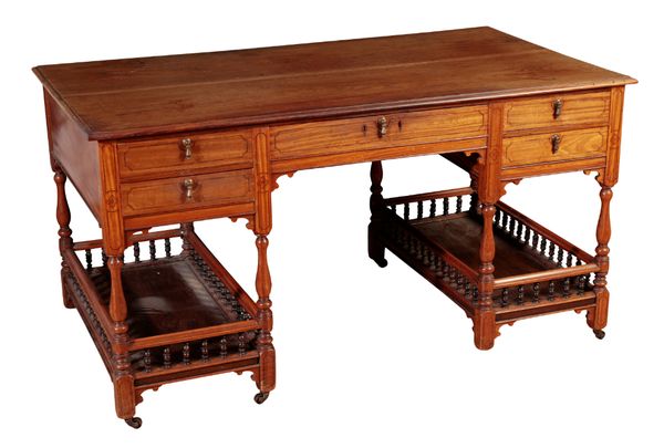 AN ARTS AND CRAFTS HARDWOOD WRITING TABLE