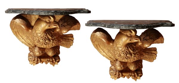 A PAIR OF NORTH ITALIAN CARVED GILTWOOD EAGLE WALL BRACKETS