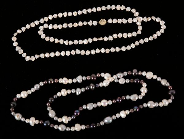 AN OPERA LENGTH CULTURED BAROQUE PEARL NECKLACE