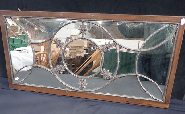 A 19TH CENTURY MIRROR WITH CAST LEAD GLAZING BARS