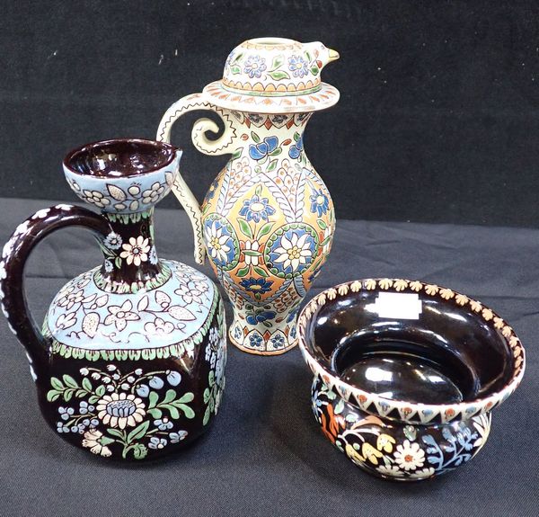 TWO 19TH CENTURY THOUNE (THUN) POTTERY EWERS