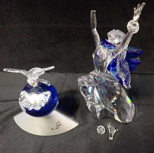 A SWAROVSKI SILVER CRYSTAL FIGURE ‘CRYSTAL PLANET VISION 2000’