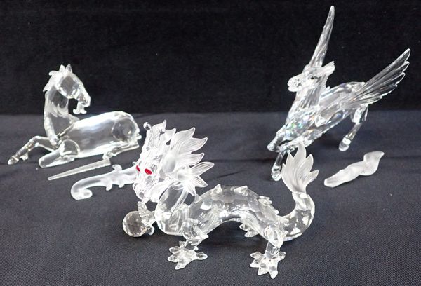 THREE SWAROVSKI CRYSTAL FIGURES - CHINESE DRAGON, UNICORN AND PEGASUS