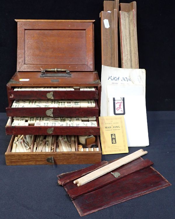 A MAH-JONG SET, HARDWOOD CASED WITH BRASS MOUNTS