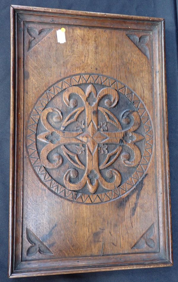 A CARVED OAK TRAY, WITH CENTRAL CROSS MOTIF