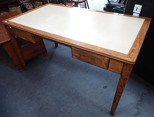 A MID-20TH CENTURY STAINED BEECH OFFICE DESK
