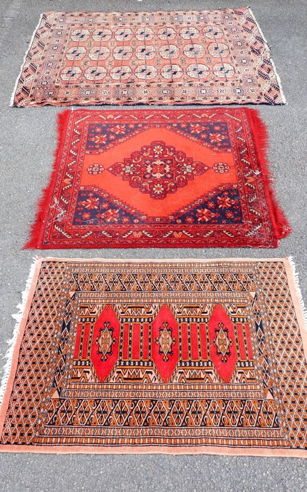 THREE SMALL RUGS