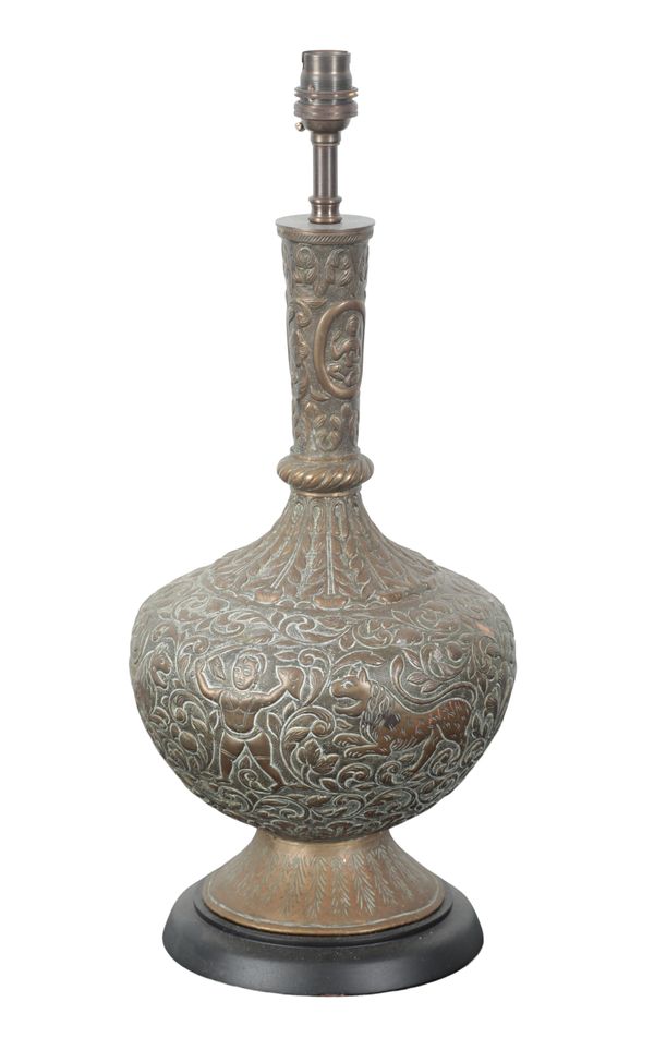 AN INDO PERSIAN COPPER AND BRONZE 'LION FLASK' LAMP